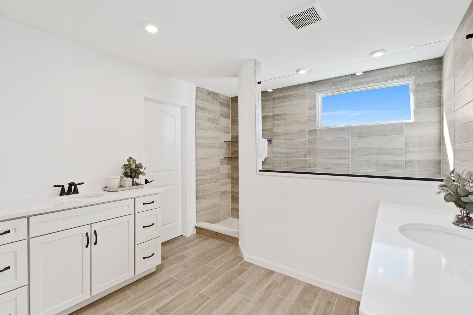 1675 Landy Lane Deerfield, IL 60015 - Photo 13 of 19 a spacious bathroom with a double vanity sink and mirror