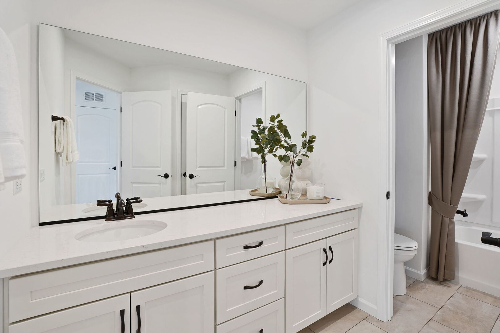 1675 Landy Lane Deerfield, IL 60015 - Photo 17 of 19 a bathroom with a sink and a mirror