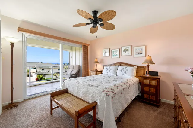 a bedroom with a bed and a table