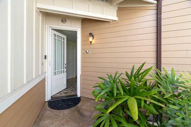 a view of a door and a window