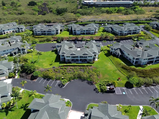 an aerial view of a house with a garden