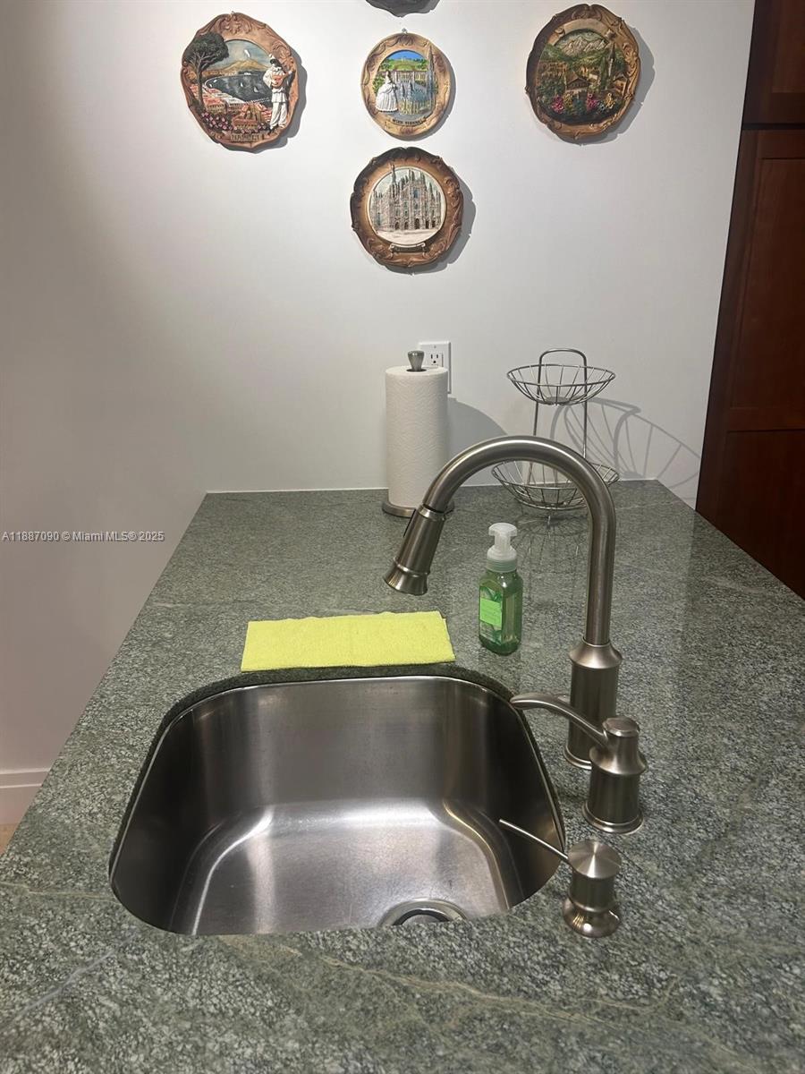 1500 South Ocean Drive, Unit A8 Hollywood, FL 33019 - Photo 19 of 53 view of a sink in a kitchen