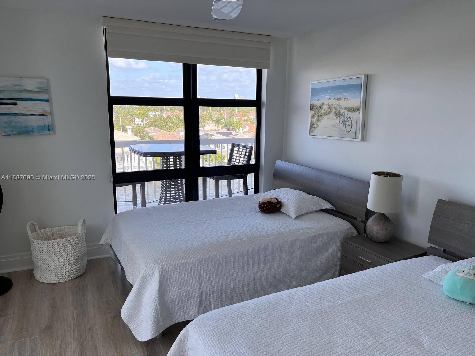 1500 South Ocean Drive, Unit A8 Hollywood, FL 33019 - Photo 21 of 53 a bedroom with furniture and a large window