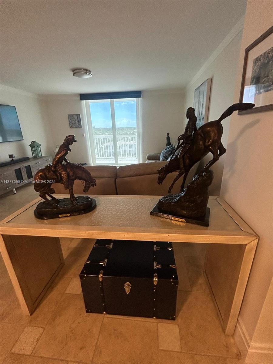 1500 South Ocean Drive, Unit A8 Hollywood, FL 33019 - Photo 6 of 53 a room with a couch and a window