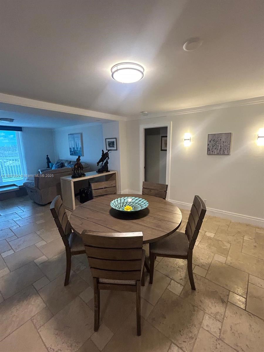 1500 South Ocean Drive, Unit A8 Hollywood, FL 33019 - Photo 10 of 53 a view of a dining room with furniture