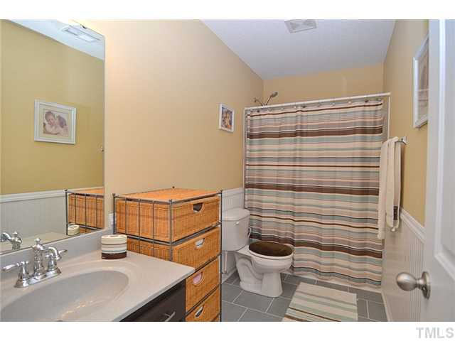 307 Rondelay Drive Durham, NC 27703 - Photo 15 of 21 Upgraded Tile in the Hall Bath too.