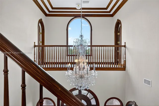 a view of a house with backyard and porch