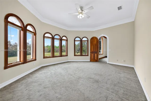 a view of a swimming pool with lounge chair