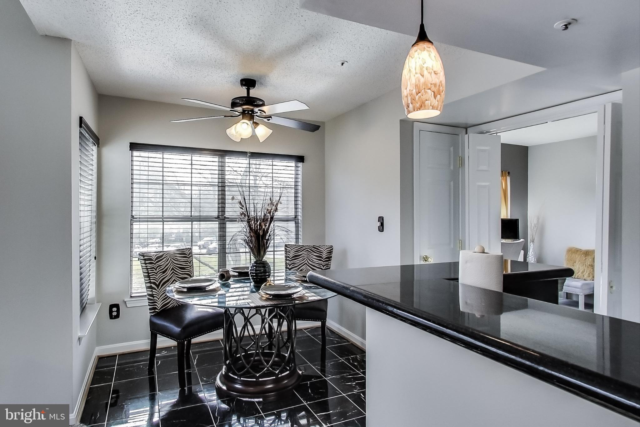 10410 Beacon Ridge Drive, Unit 202 Bowie, MD 20721 - Photo 46 of 47 Open Floor Plan - Dining Area - Marble Tile Floors