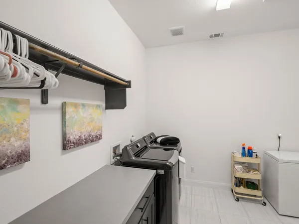 a view of a workspace with furniture