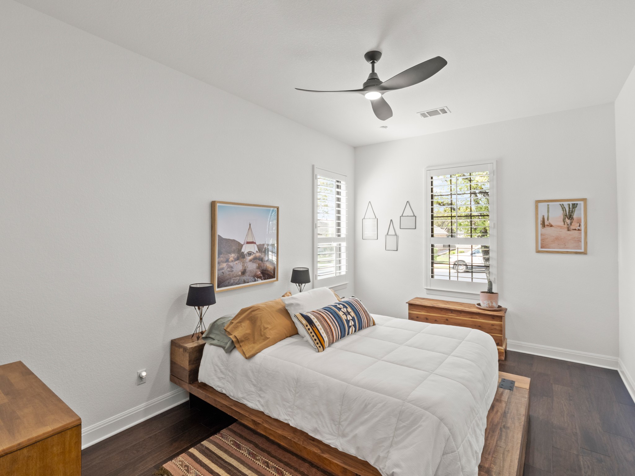 120 Eagle Pass Trail Georgetown, TX 78628 - Photo 21 of 32 a bedroom with a large bed and a window
