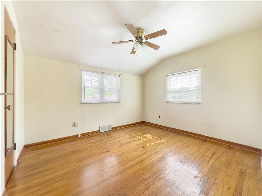 2023 Spring Hill Road Pittsburgh, PA 15243 - Photo 16 of 20 a view of a big room with wooden floor and windows
