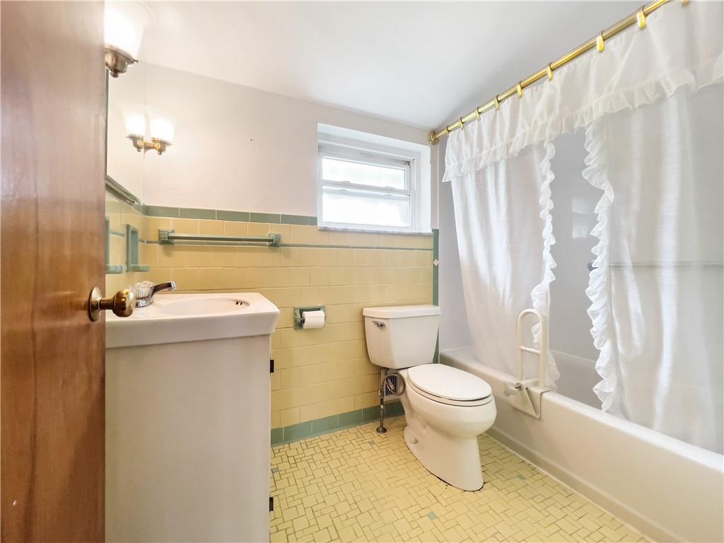 2023 Spring Hill Road Pittsburgh, PA 15243 - Photo 17 of 20 a bathroom with a sink toilet and shower