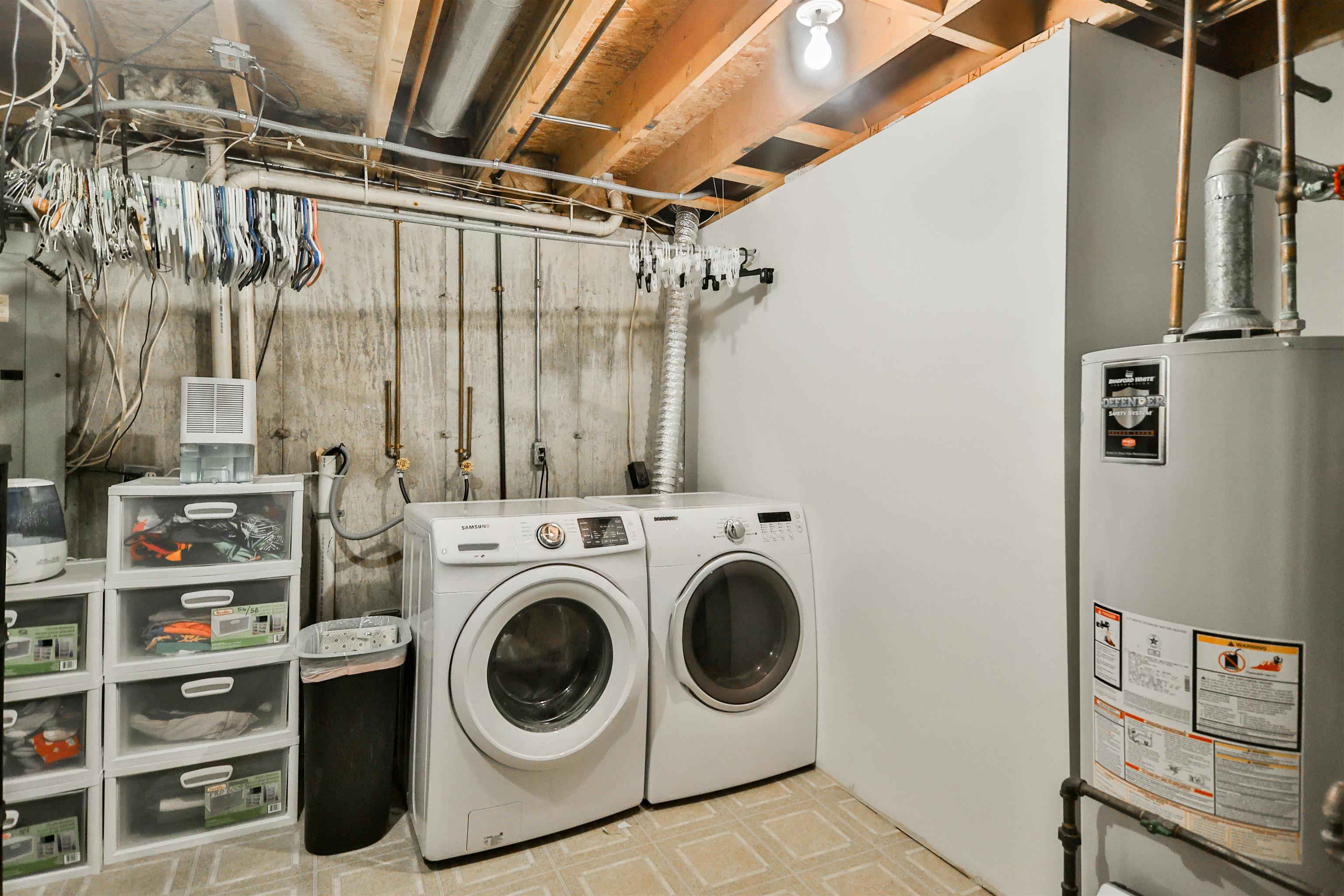 155 Lamplighter Loop Southeast Poplar Grove, IL 61065 - Photo 27 of 31 a utility room with dryer and washer