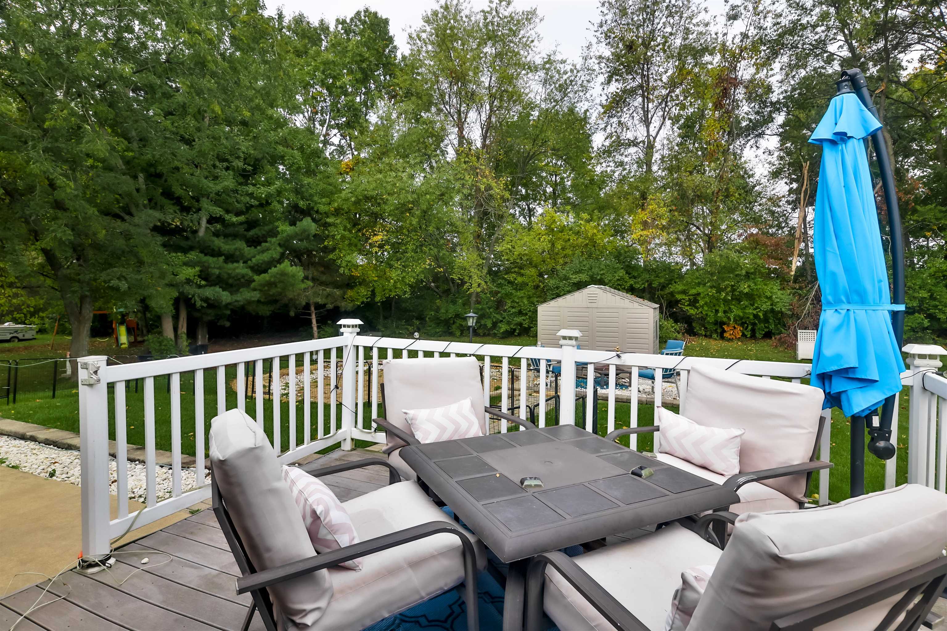 155 Lamplighter Loop Southeast Poplar Grove, IL 61065 - Photo 30 of 31 a view of a chair and table in the deck