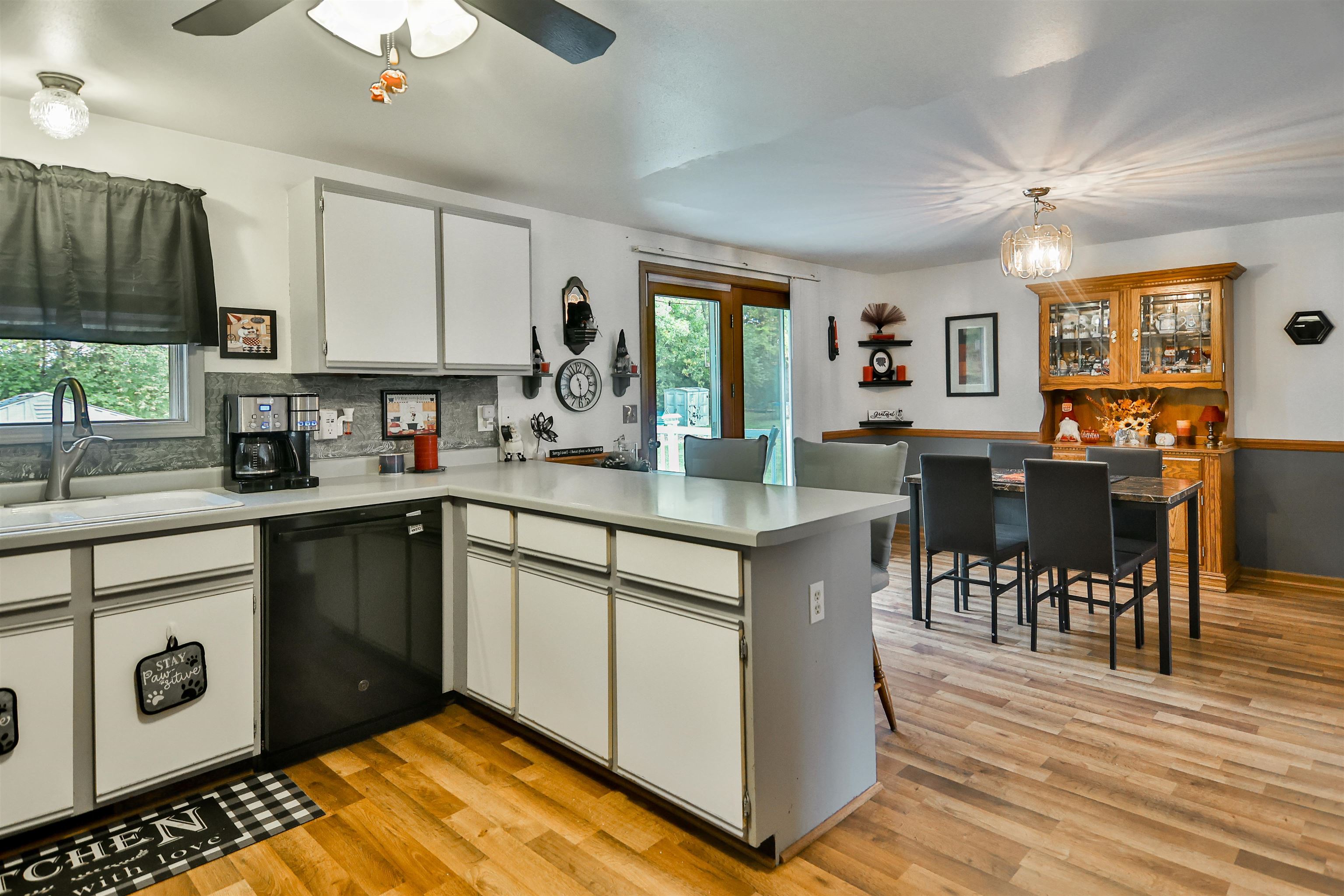 155 Lamplighter Loop Southeast Poplar Grove, IL 61065 - Photo 8 of 31 a kitchen with stainless steel appliances granite countertop a stove and a refrigerator