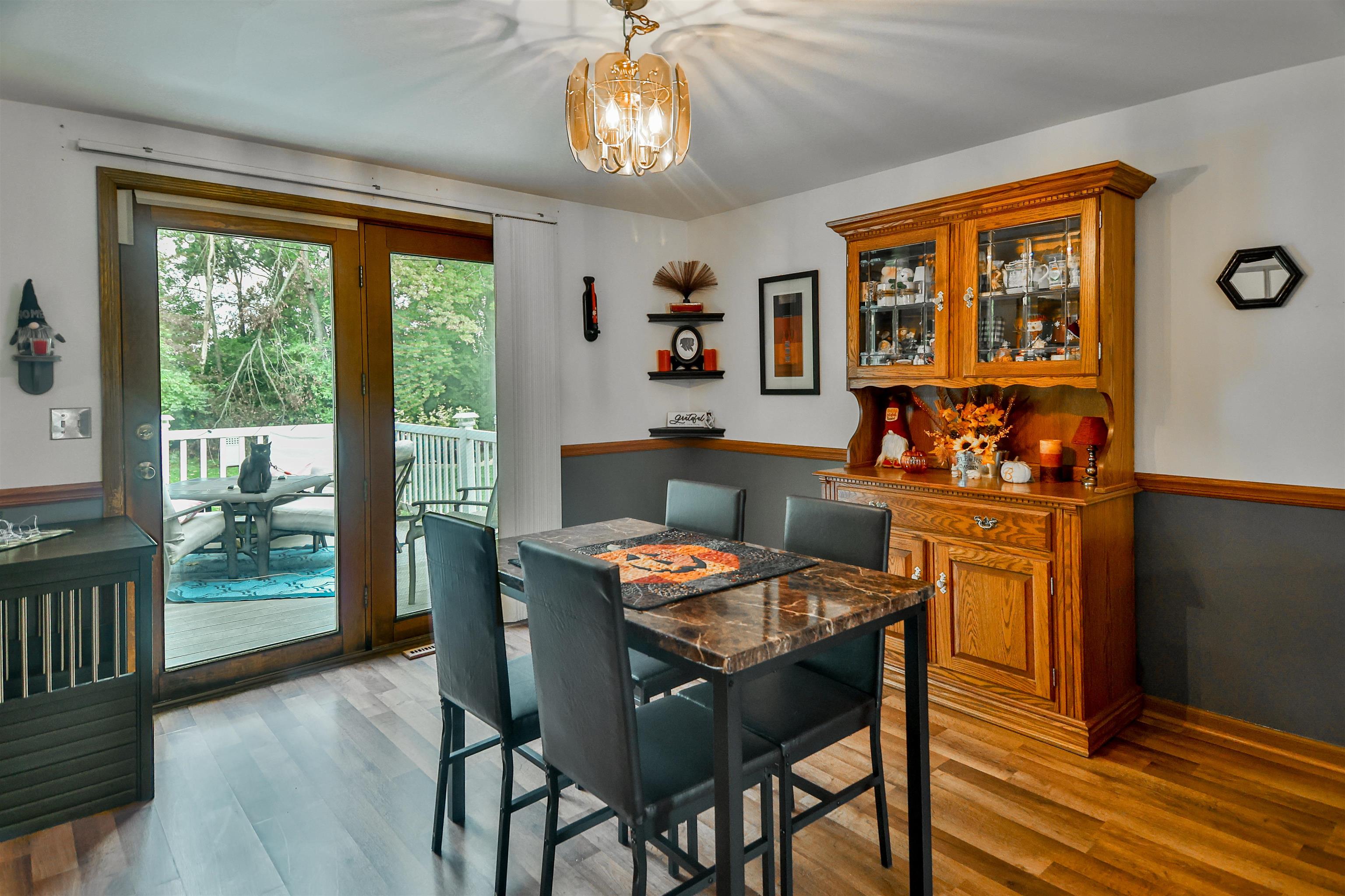 155 Lamplighter Loop Southeast Poplar Grove, IL 61065 - Photo 10 of 31 a dinning table and chairs in a room