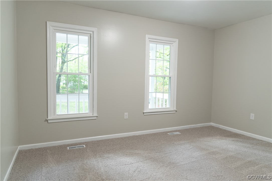 10807 Drayton Road Chester, VA 23831 - Photo 15 of 32 an empty room with a window