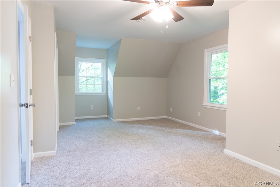 10807 Drayton Road Chester, VA 23831 - Photo 24 of 32 an empty room with windows and closet