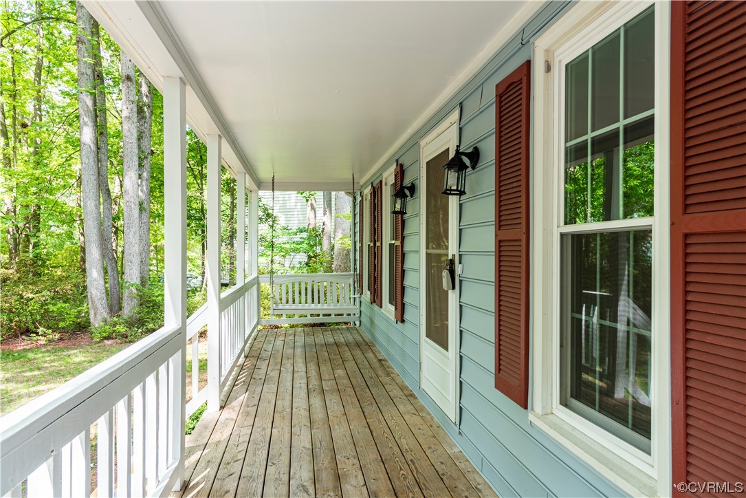 10807 Drayton Road Chester, VA 23831 - Photo 32 of 32 a view of balcony with wooden floor