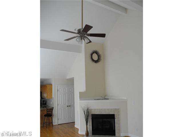 1185 Surry Line Road Pinnacle, NC 27043 - Photo 2 of 8 Living Room. THE LR HAS SOARING CATHEDRAL CEILINGS AND OAK FLOORS.
