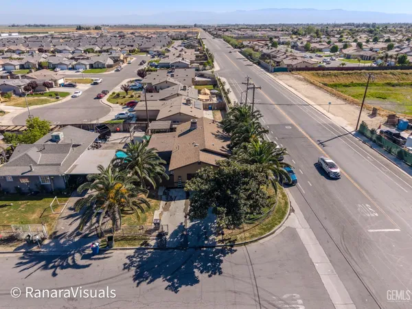 an aerial view of a house with a garden
