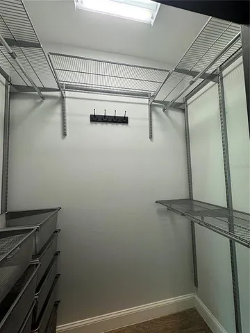 a view of a room with racks on the wall