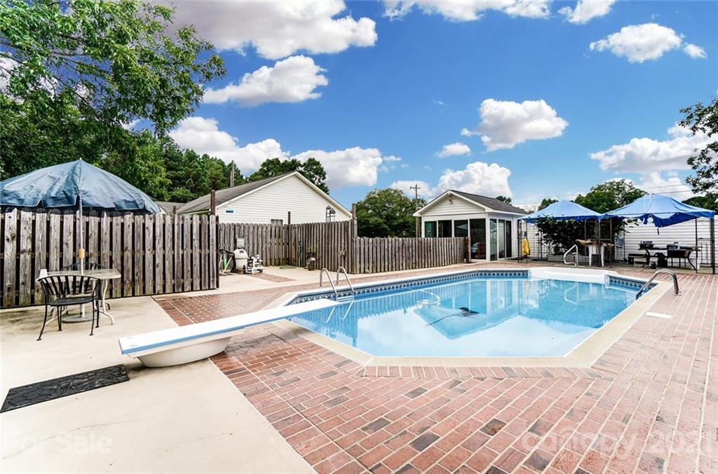 1853 Dunlap Roddey Road Rock Hill, SC 29730 - Photo 15 of 19 a view of a house with swimming pool and sitting area
