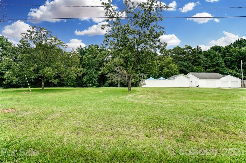 1853 Dunlap Roddey Road Rock Hill, SC 29730 - Photo 17 of 19 a view of a garden with a lake