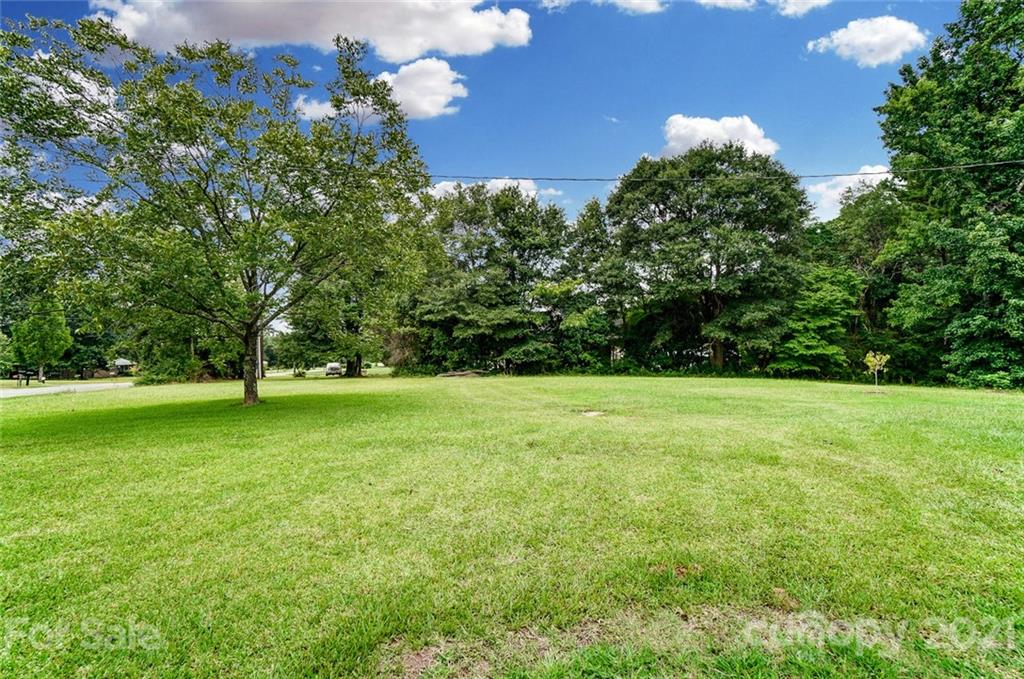 1853 Dunlap Roddey Road Rock Hill, SC 29730 - Photo 19 of 19 a view of a field of grass and trees