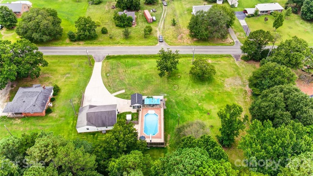 1853 Dunlap Roddey Road Rock Hill, SC 29730 - Photo 3 of 19 an aerial view of a house with a yard and swimming pool