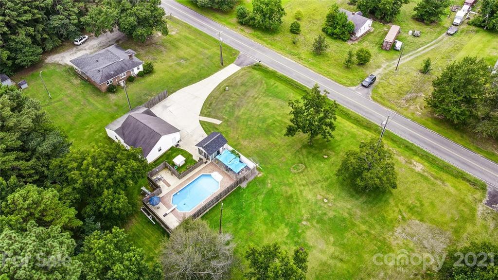 1853 Dunlap Roddey Road Rock Hill, SC 29730 - Photo 4 of 19 an aerial view of a house with a garden and swimming pool