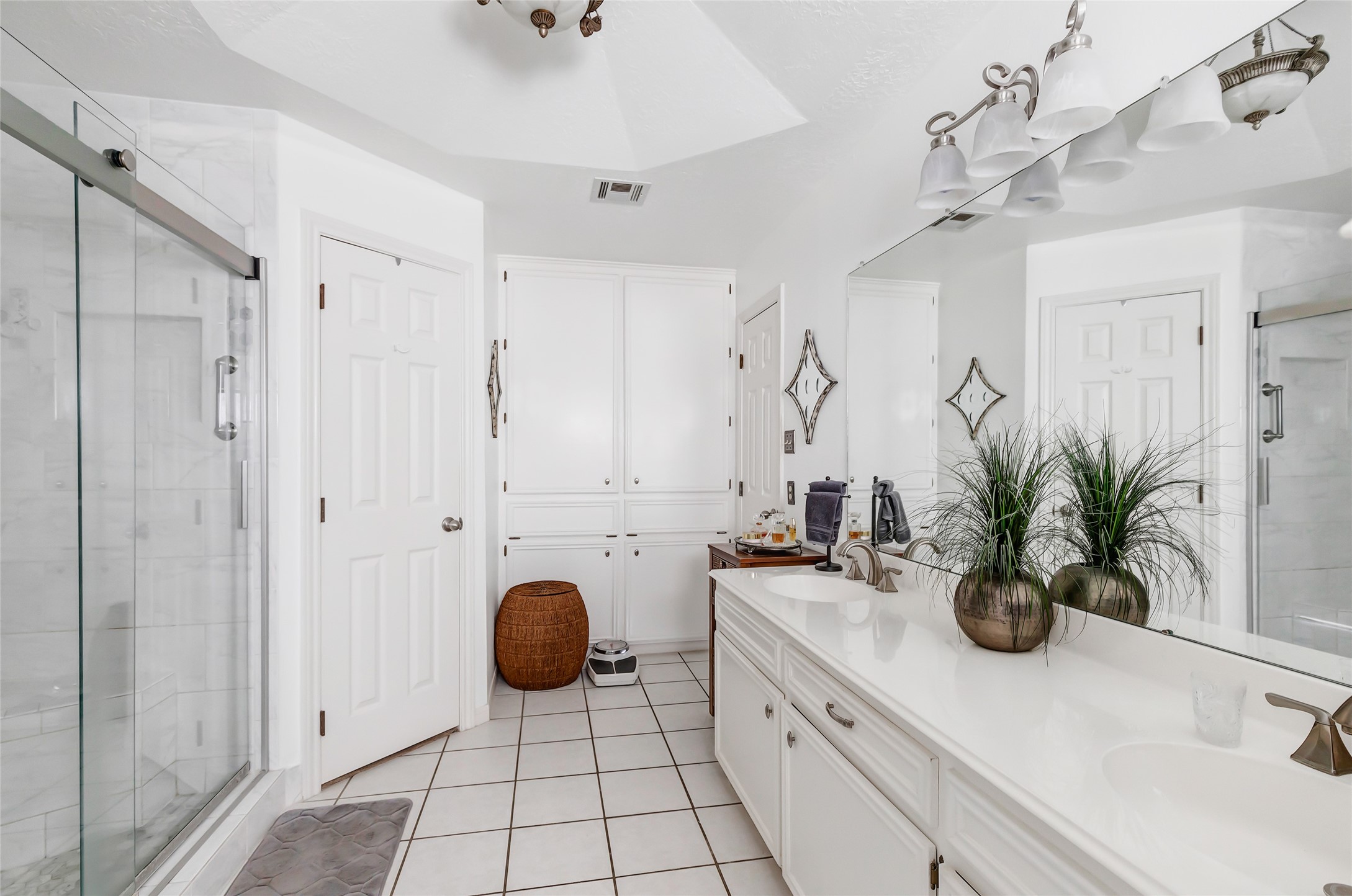 27414 Kathy Lane Magnolia, TX 77355 - Photo 22 of 41 This primary bathroom has two walk in closets and plenty of storage.