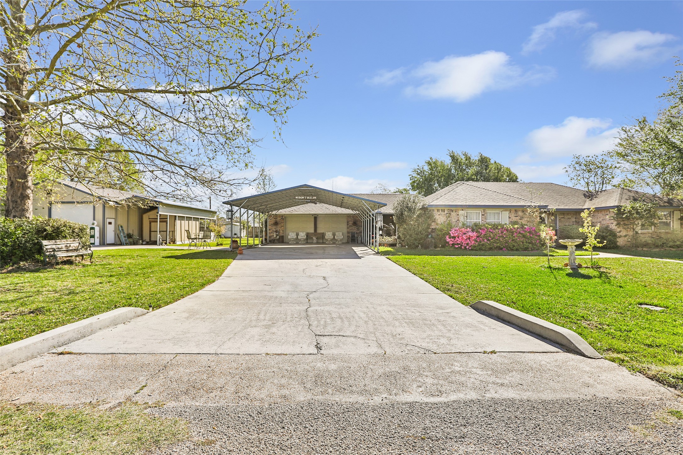 27414 Kathy Lane Magnolia, TX 77355 - Photo 4 of 41 There are two driveways - one leading to main home and one leading to shop.