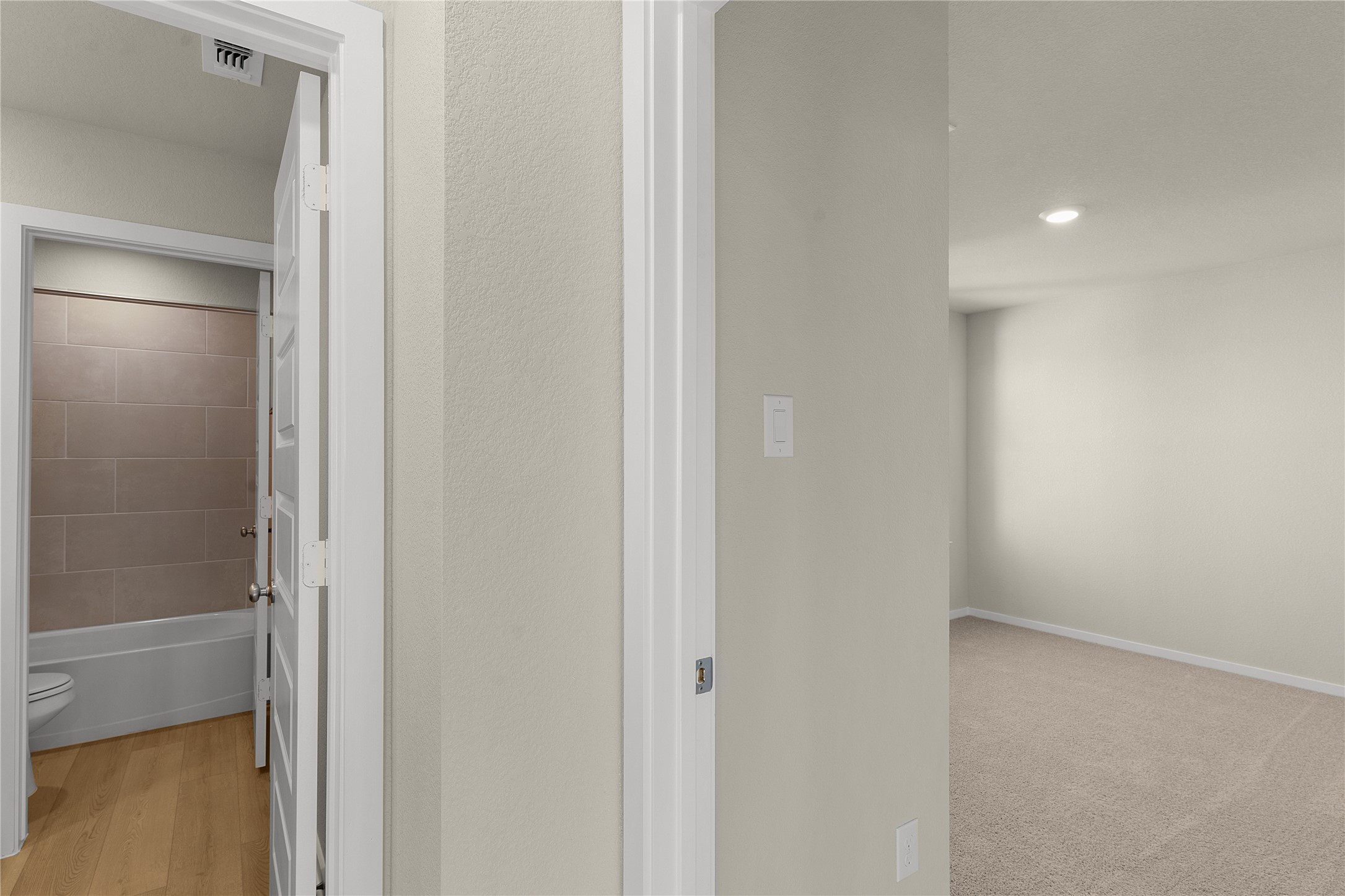 25628 Wheat Seed Lane Elgin, TX 78621 - Photo 18 of 20 Hallway with recessed lighting