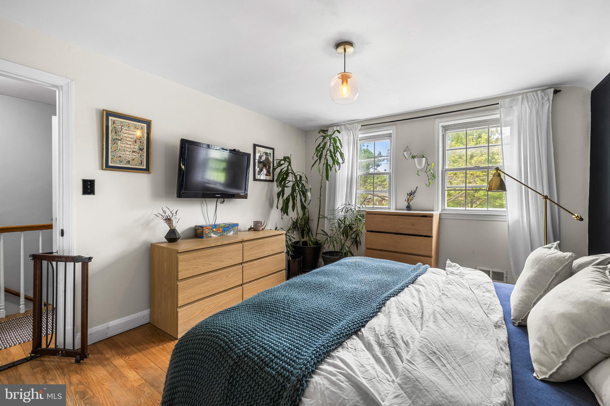 1620 Hardwick Road Towson, MD 21286 - Photo 23 of 38 a bedroom with a bed and a flat screen tv