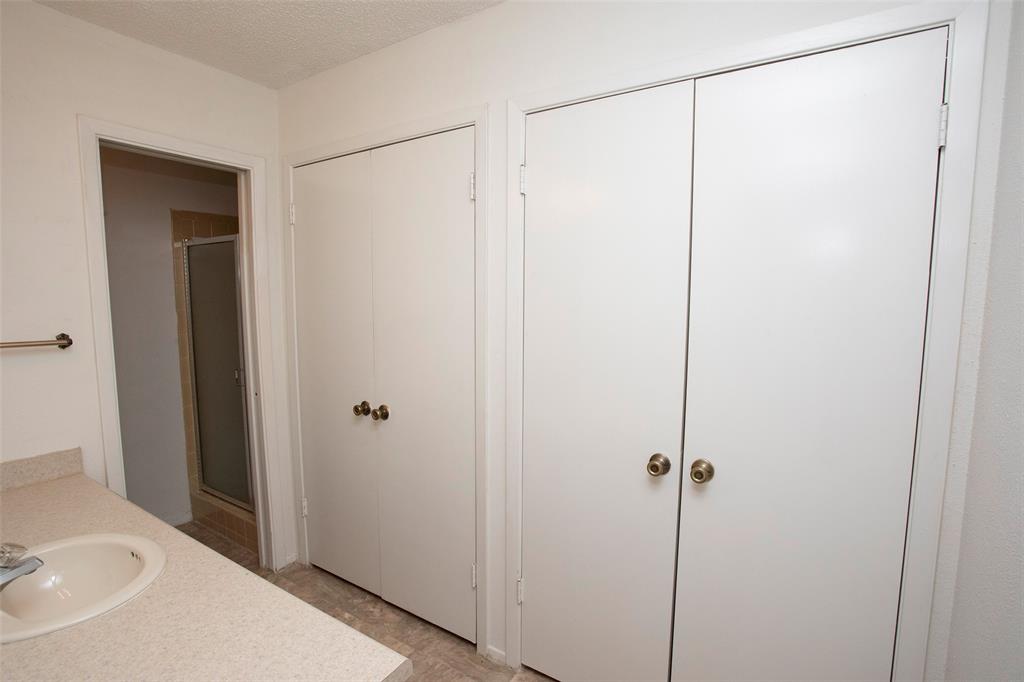 1202 Randy Drive Graham, TX 76450 - Photo 11 of 40 a bathroom with a shower and a sink