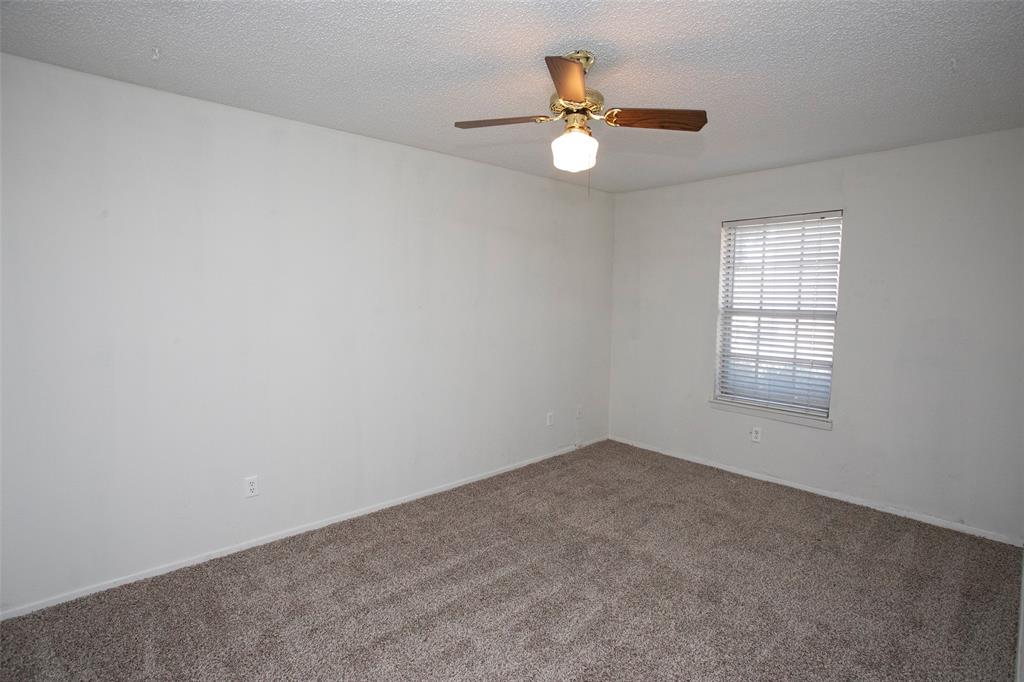 1202 Randy Drive Graham, TX 76450 - Photo 19 of 40 an empty room with a window