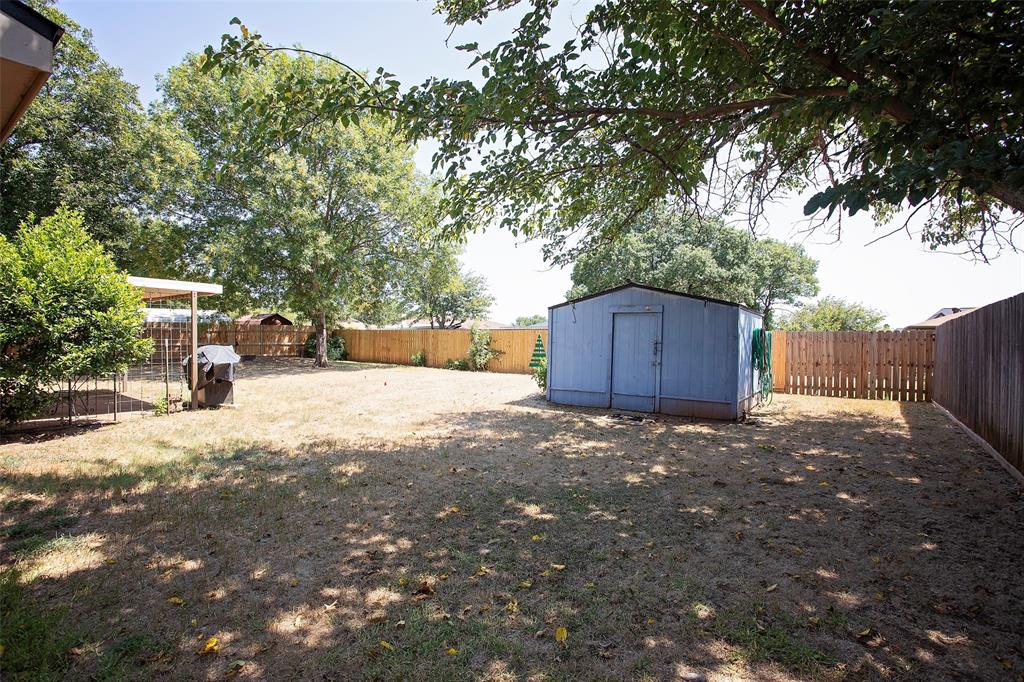 1202 Randy Drive Graham, TX 76450 - Photo 32 of 40 a backyard of a house