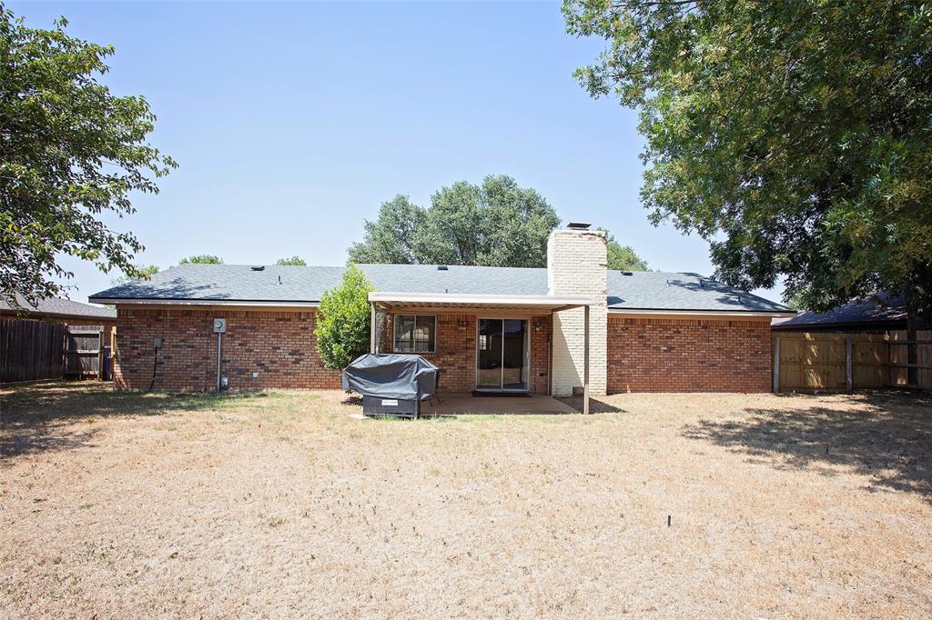 1202 Randy Drive Graham, TX 76450 - Photo 35 of 40 a view of a house with backyard and sitting area