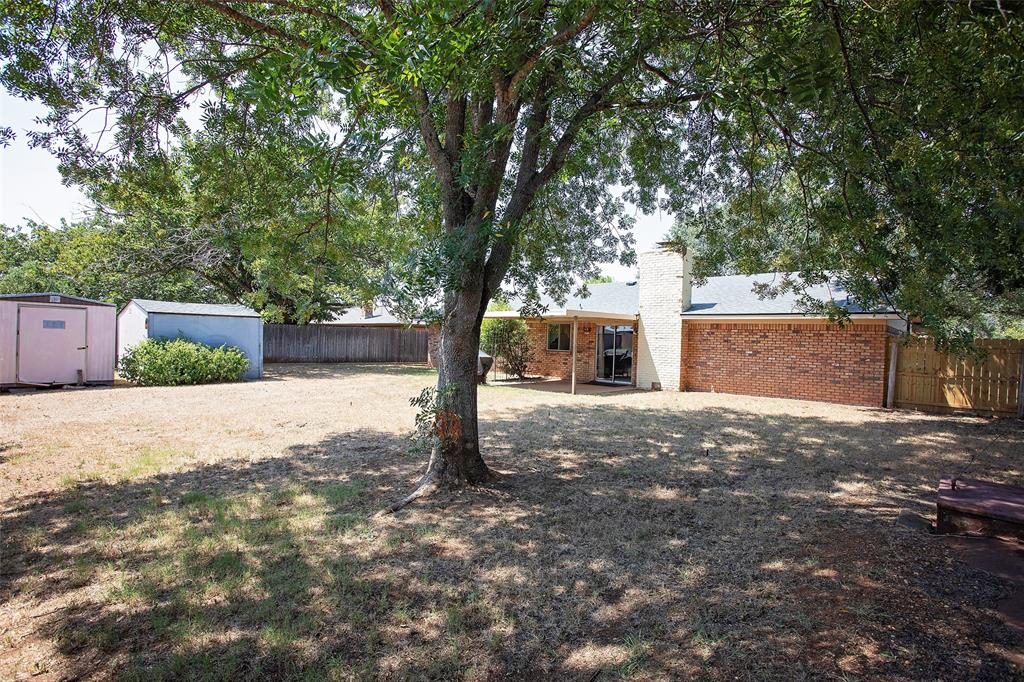1202 Randy Drive Graham, TX 76450 - Photo 37 of 40 a view of a yard with a tree