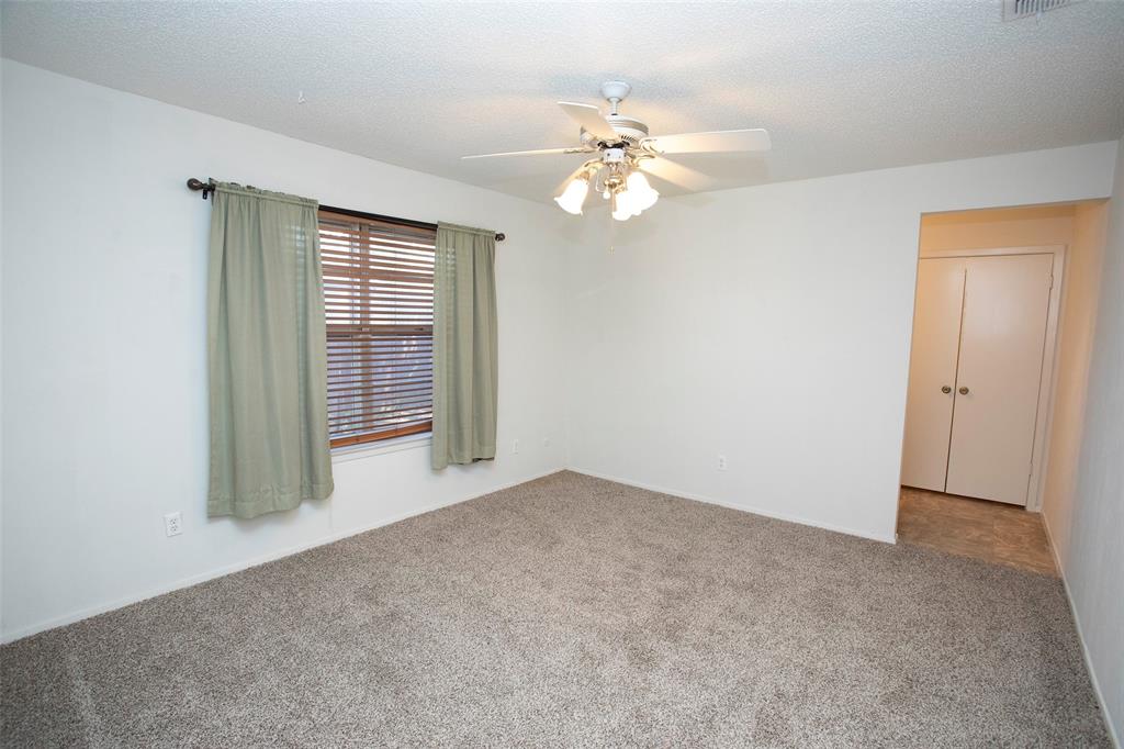 1202 Randy Drive Graham, TX 76450 - Photo 8 of 40 a view of an empty room with a window