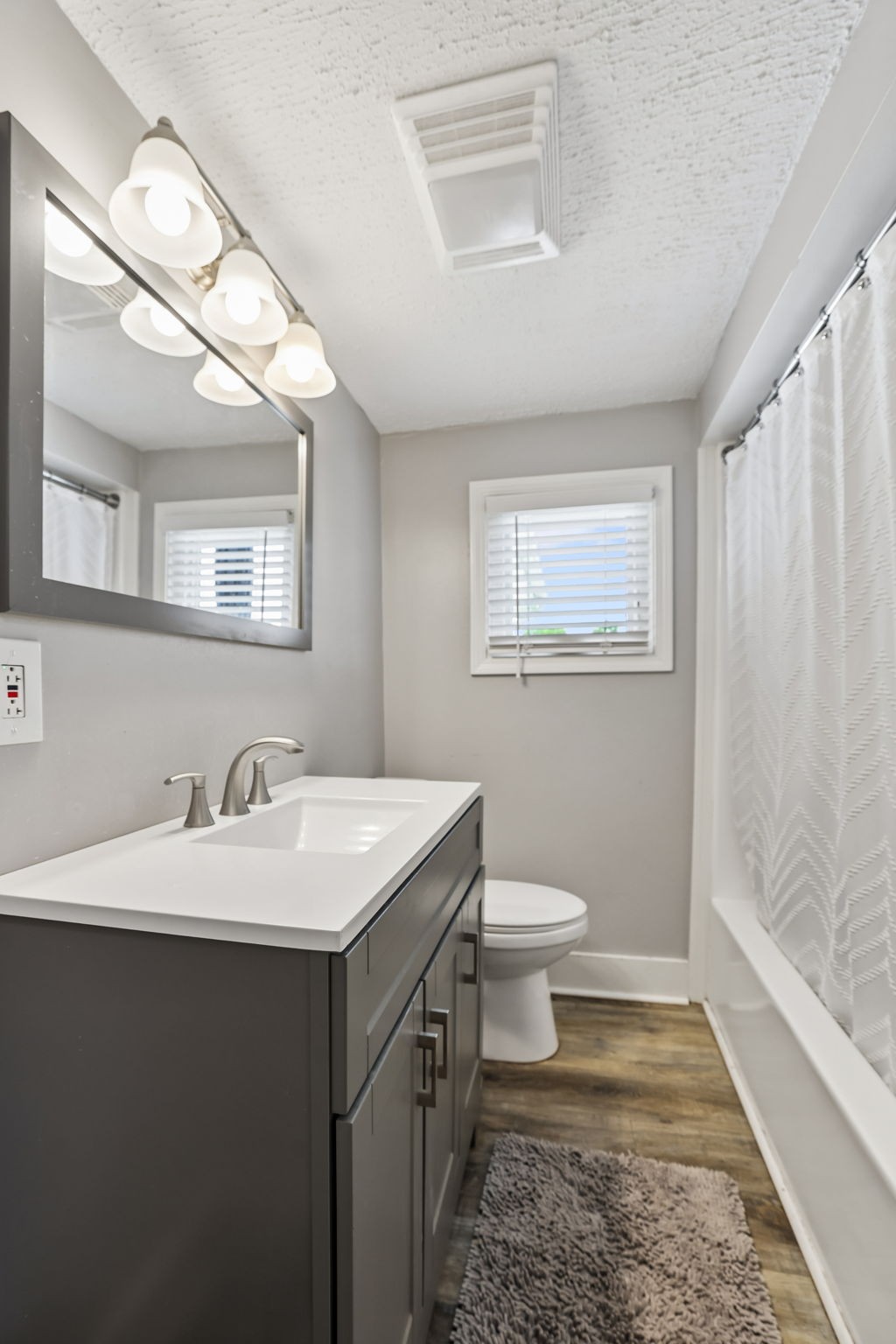 1466 Bible Crossing Road Winchester, TN 37398 - Photo 27 of 42 a bathroom with a sink a toilet and a mirror