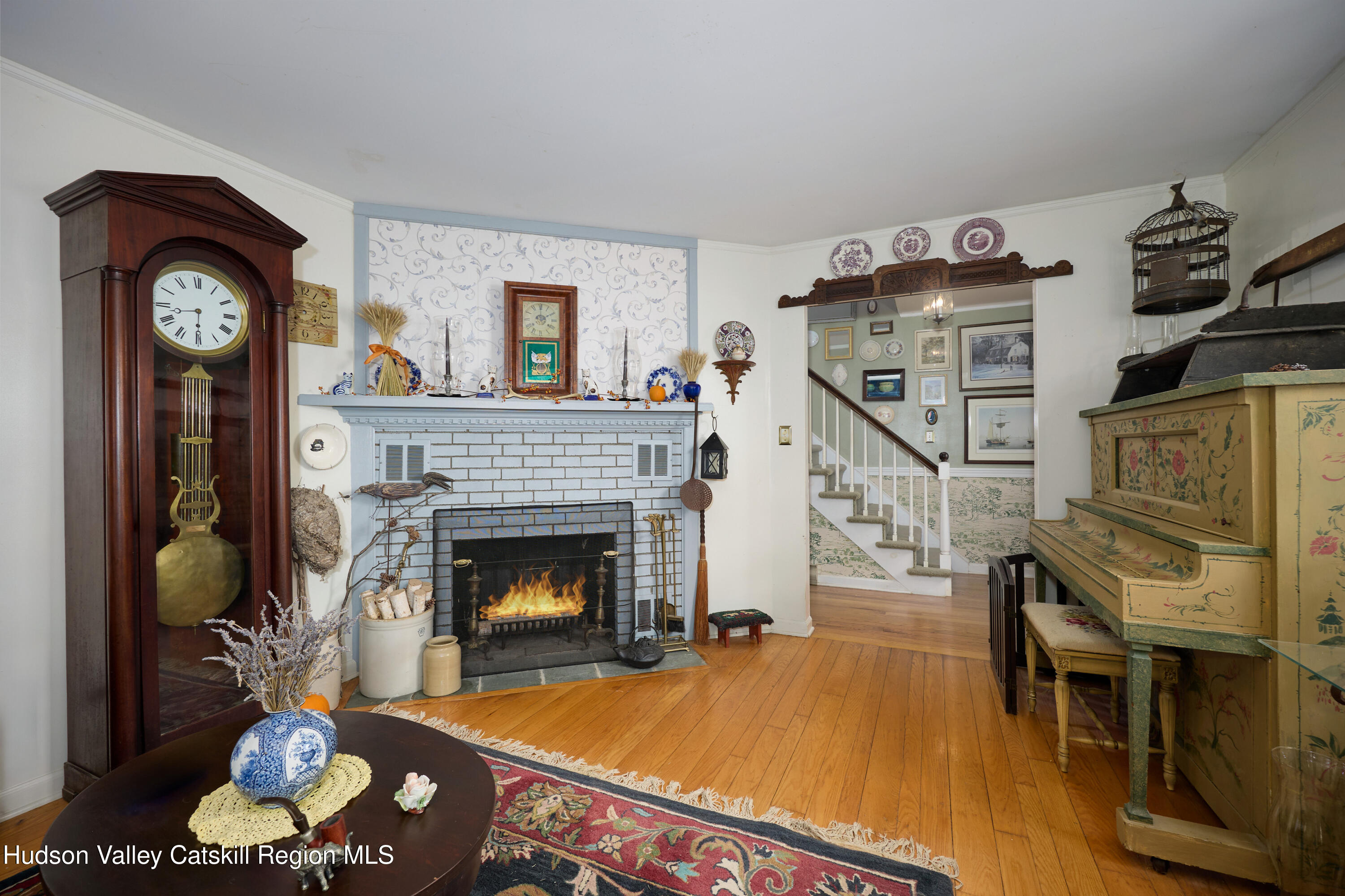 40 Engel Road Old Chatham, NY 12136 - Photo 11 of 37 a living room with furniture and a fireplace