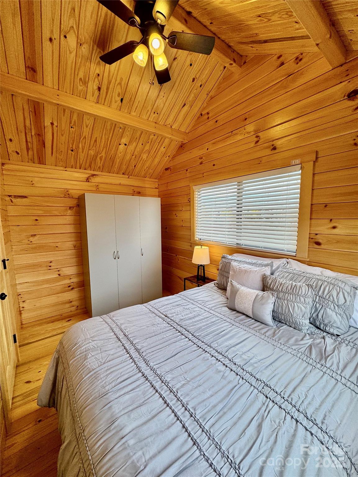 37 Bream Loop Marion, NC 28752 - Photo 16 of 22 a bedroom with a bed and a window