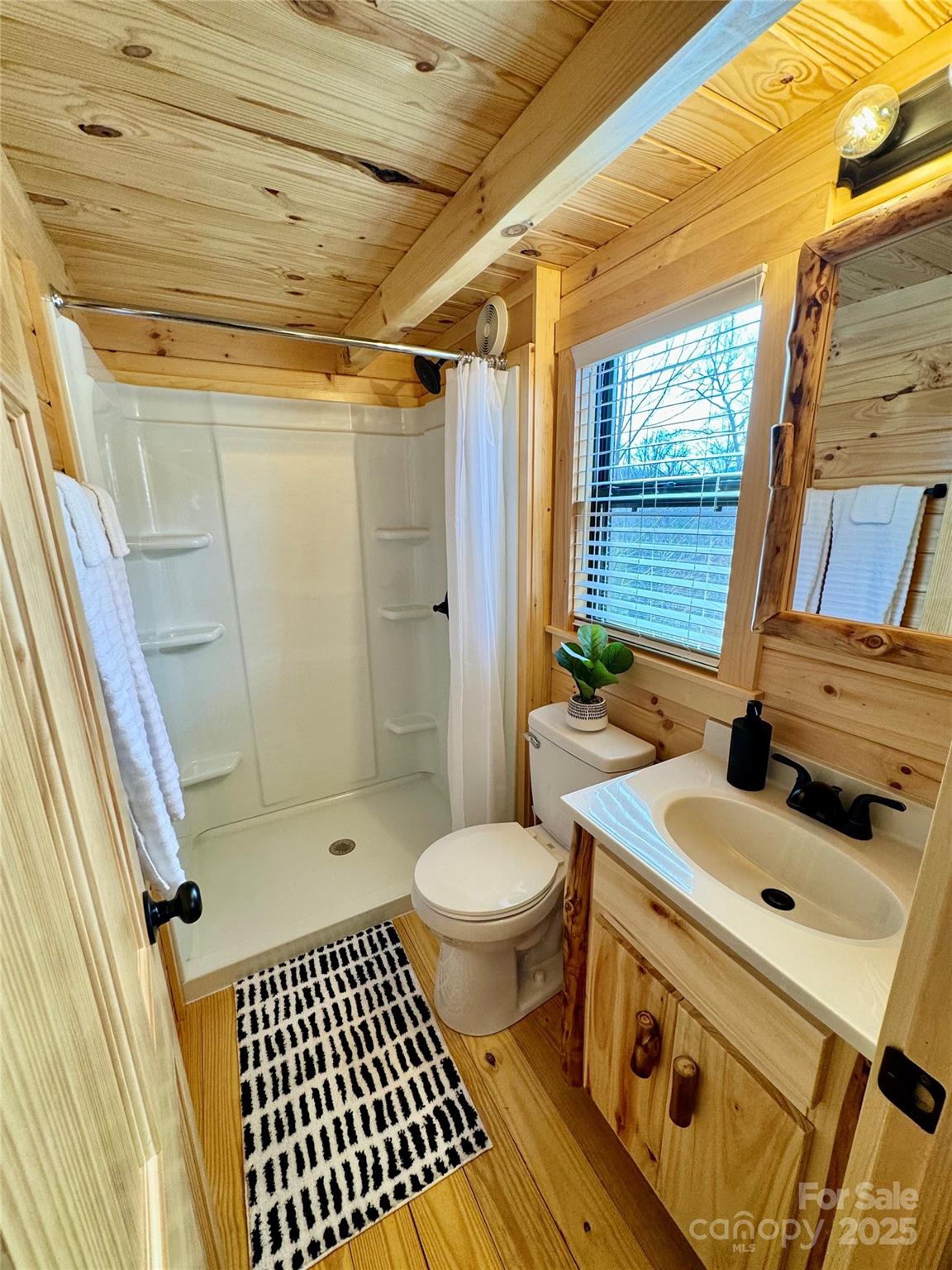 37 Bream Loop Marion, NC 28752 - Photo 20 of 22 a bathroom with a sink toilet and shower
