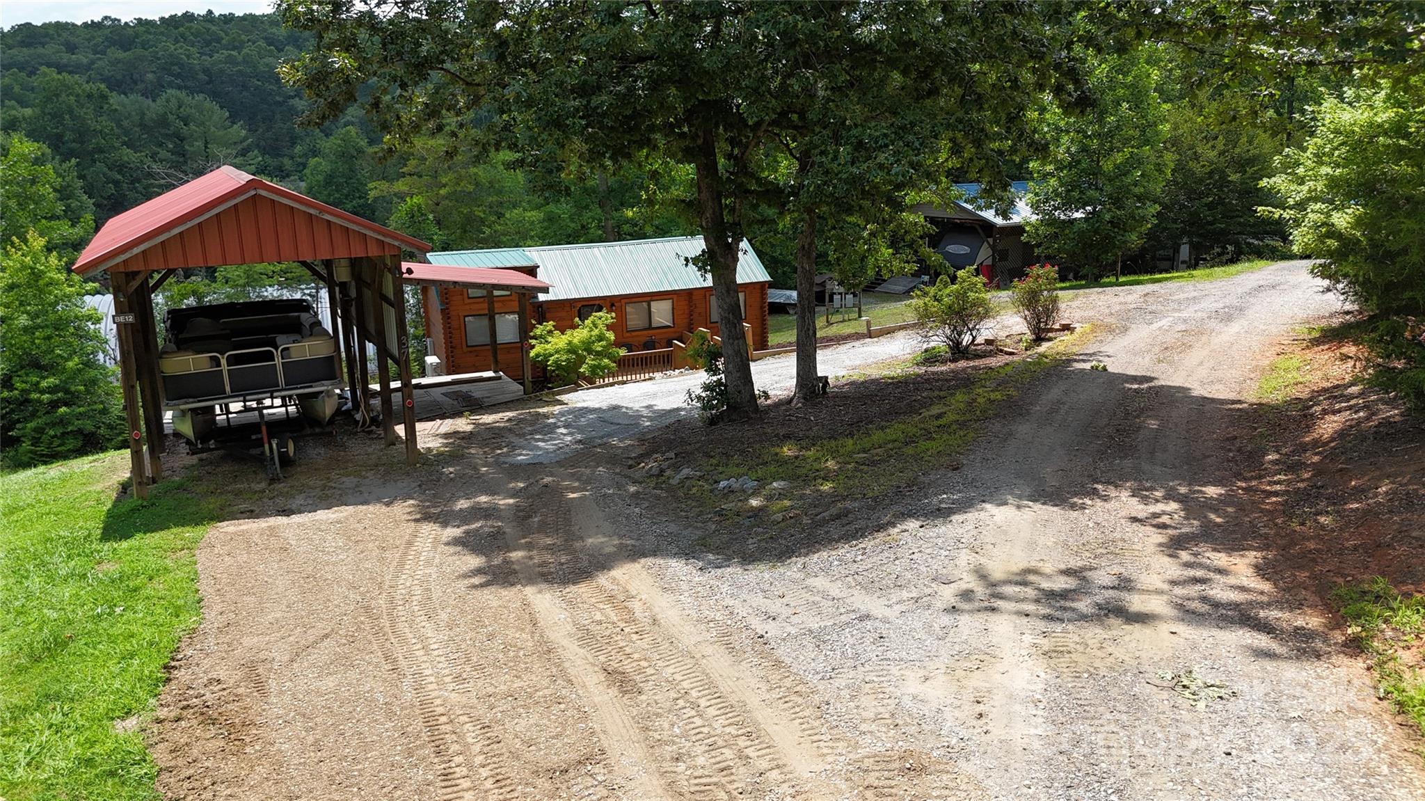 37 Bream Loop Marion, NC 28752 - Photo 4 of 22 a view of a house with a yard