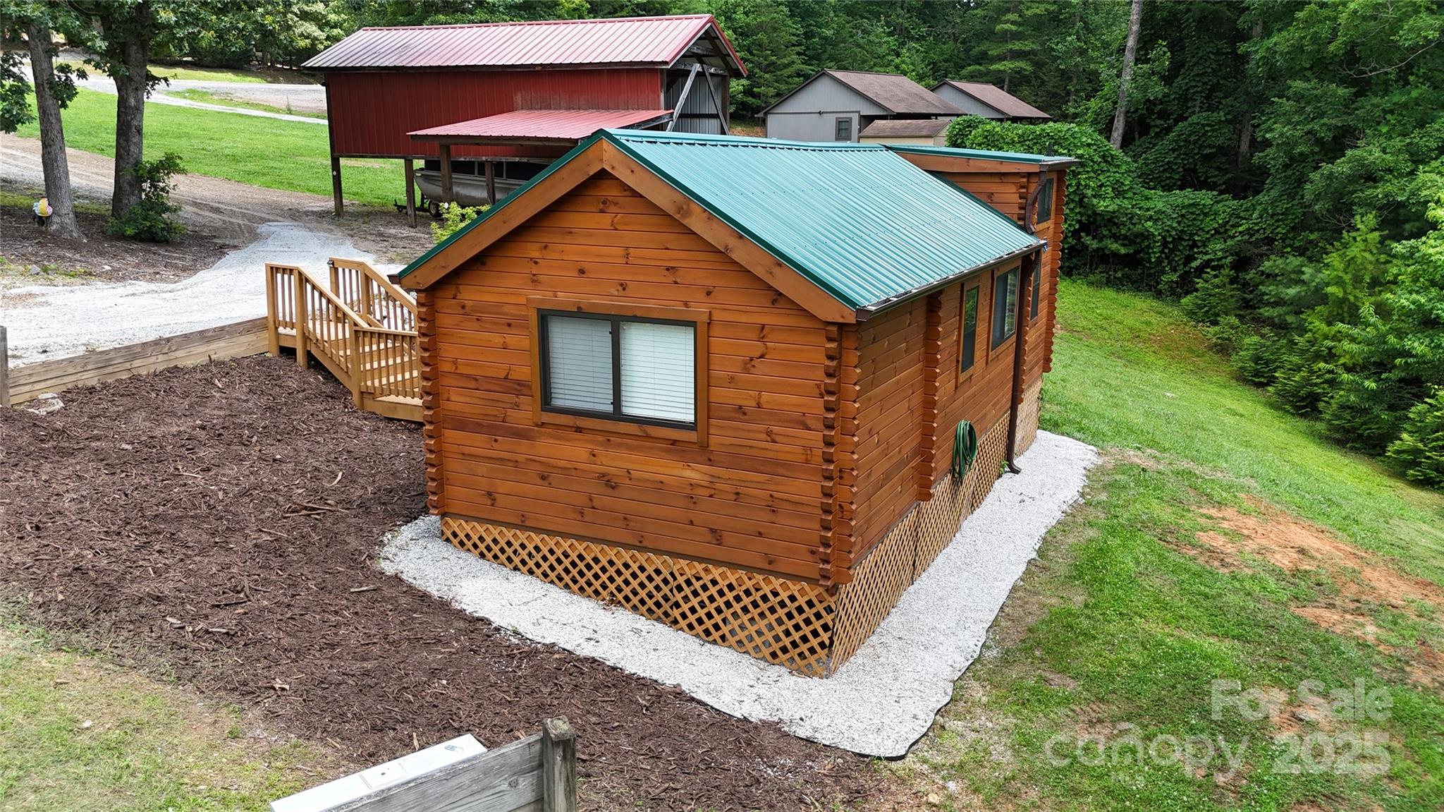 37 Bream Loop Marion, NC 28752 - Photo 7 of 22 a view of a house with a yard