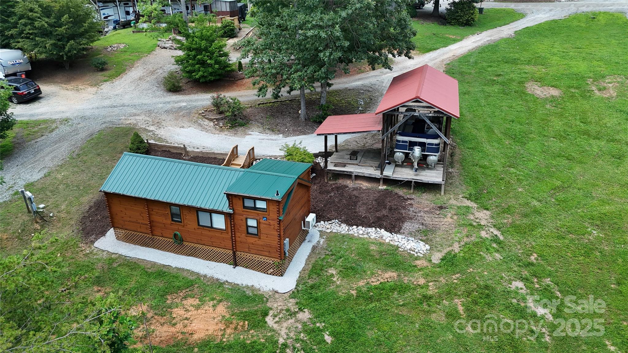 37 Bream Loop Marion, NC 28752 - Photo 8 of 22 an aerial view of a house with backyard garden and swimming pool