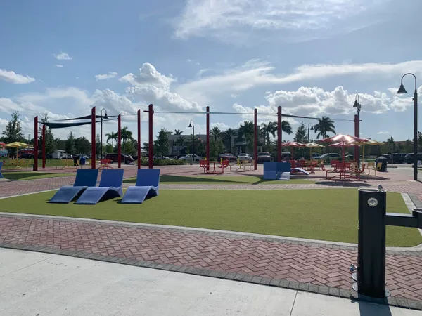 a park with lots of trees and plants